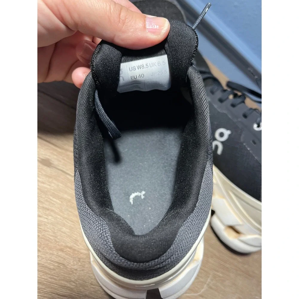 On Cloudnovel Women's Black and Cream Athletic Shoes